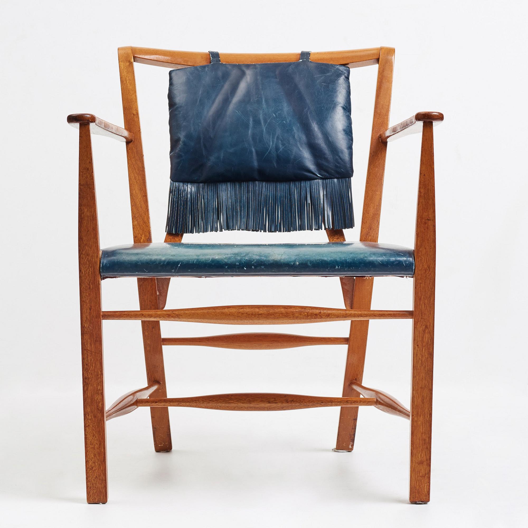 Josef Frank, a mahogany and blue leather chair for Firma Svenskt Tenn, Sweden probably 1950-60's.