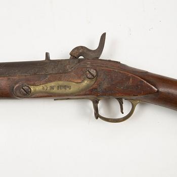 A 18th Century Swedish-British converted percussion gun.