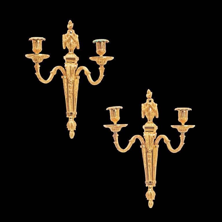 A pair of North European late 18th century two-light wall-lights.