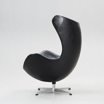 An Arne Jacobsen black leather 'Egg' chair, Fritz Hansen, Denmark 1964.