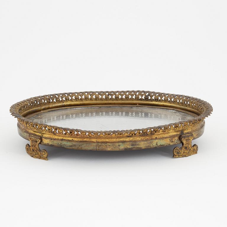 An late Empire gilt brass mirrored plateau, mid part of the 19th Century.