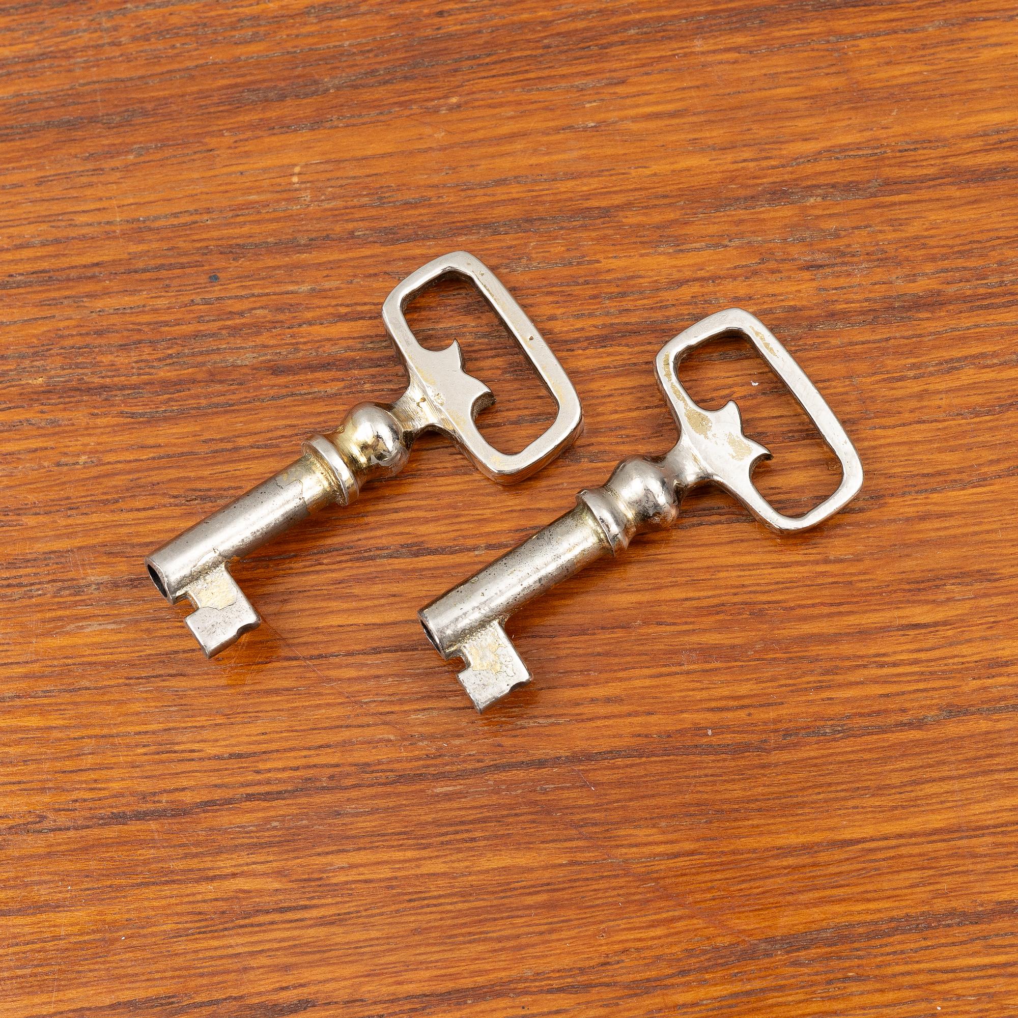 A mid20th century teak-veneered sideboard.