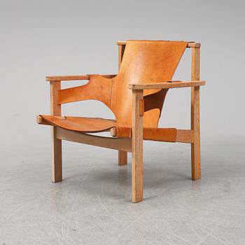 CARL-AXEL ACKING, an oak and leather 'Trienna' easy chair from Källemo.