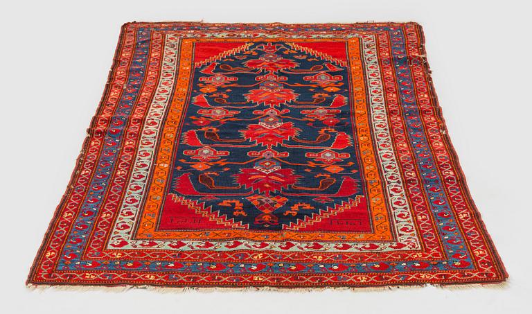 A kazak rug, south caucasus dated, ca. 201 x 135 cm.