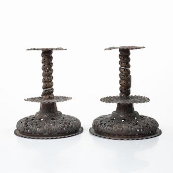 A pair of candlesticks. Copper, Baroque style, second half of the 19th century.