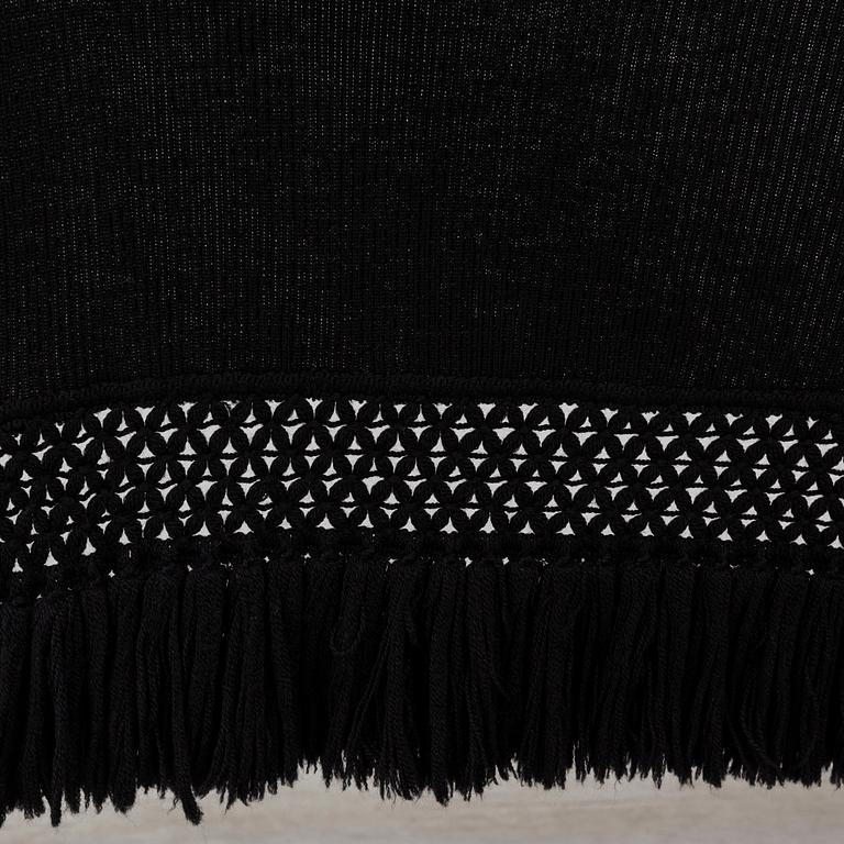 LOUIS FÉRAUD, a wool shawl.