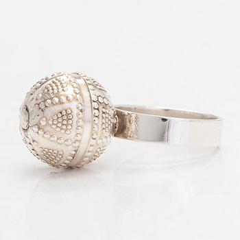 A set of silver "Halikko treasure" necklace, bracelet, ring and earrings. Kalevala Koru, Helsinki 1965-1972.