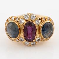 Ring, Evert Lindberg, 18K gold, set with star sapphires and rubies, as well as brilliant-cut and octagonal-cut diamonds.