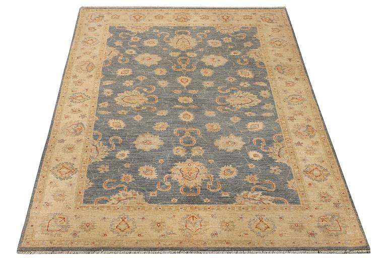 An Ushak rug, c. 242 x 165 cm.