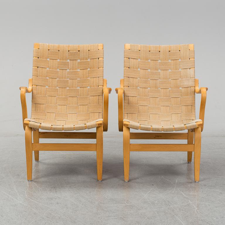 A pair of 'Eva' easy chairs by Bruno Mathsson, Firma Karl Mathsson, Värnamo 1973.