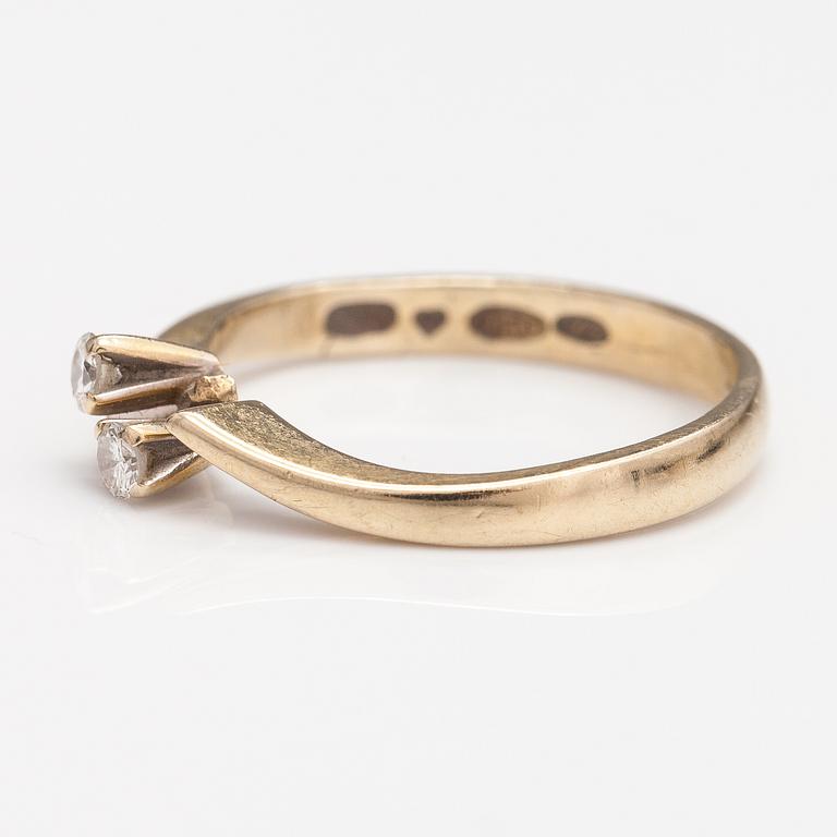 An 18K gold ring with diamonds ca. 0.12 ct in total. Finland 1974.