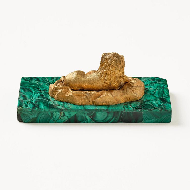 A Russian Nicholas II malachite-veneered and gilt-bronze paperweight, late 19th century.