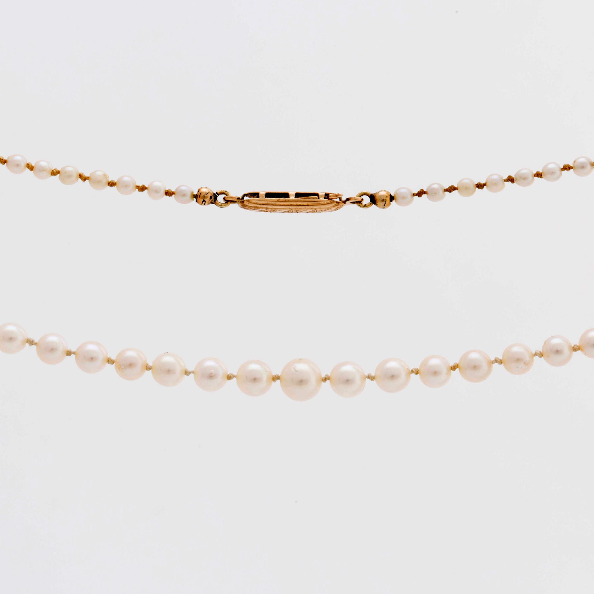 PÄRLCOLLIER odlade pärlor ca 2,5 - 5,5mm, lås i 18K guld.