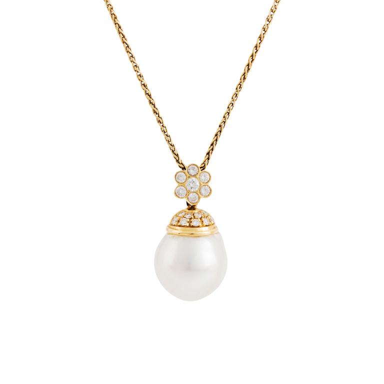 An 18K gold and cultured South Sea pearl pendant set with round brilliant-cut diamonds.