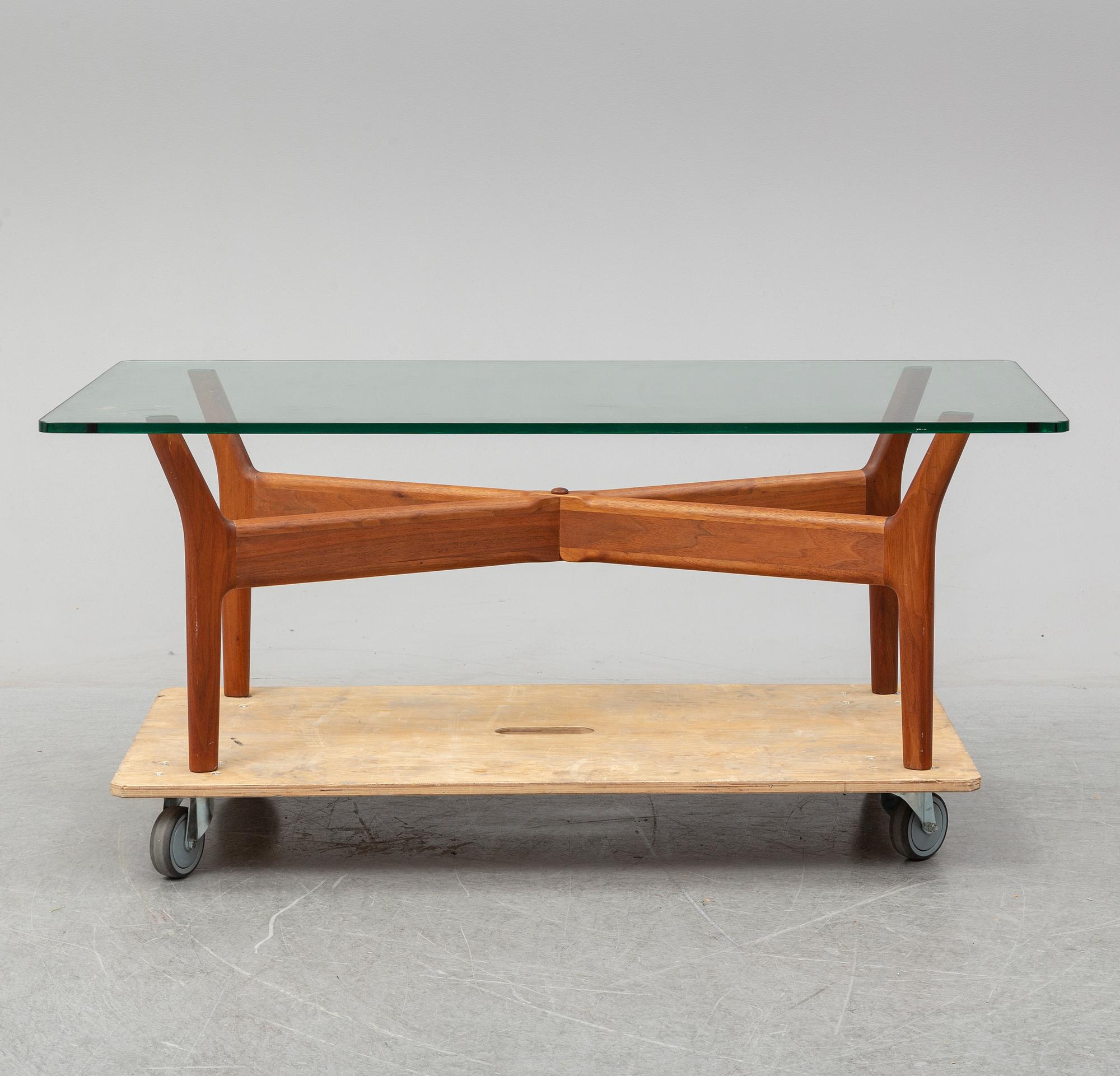 ALF SVENSSON, A teak and glass coffee table, mid 20th Century.
