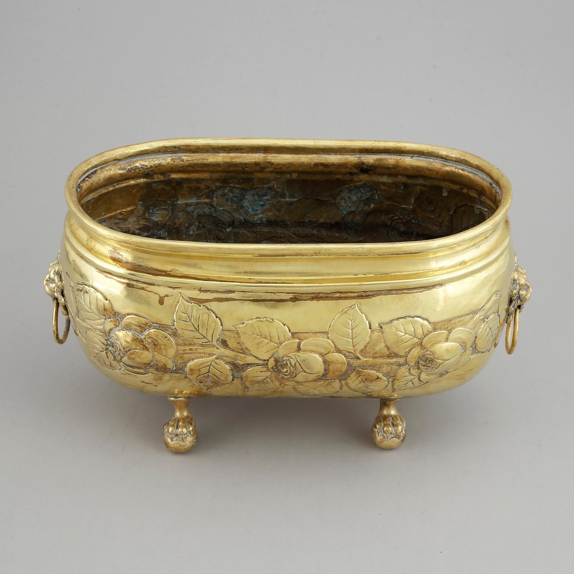 A 19th century brass jardiniere.
