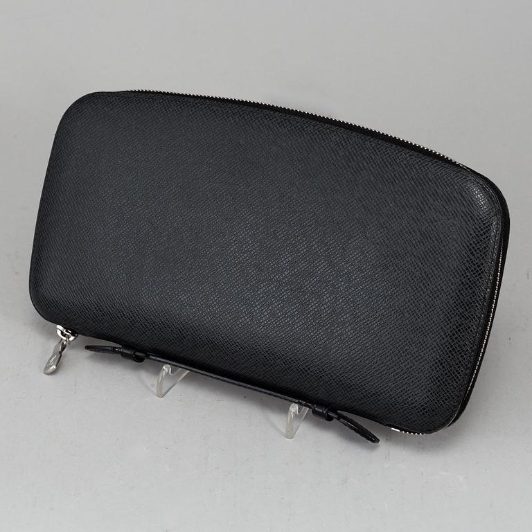 LOUIS VUITTON, an 'Atoll Ardiose' Taiga leather trave organizer, 2015.