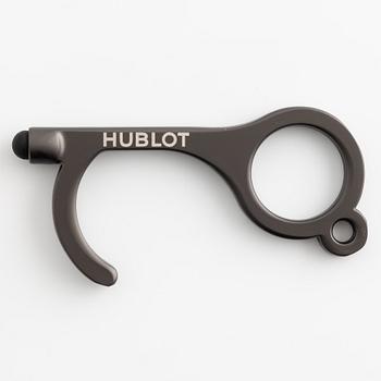 Hublot, dörröppnare/smartphone-pekare.