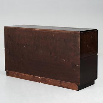Axel Einar Hjorth, a darkly stained birch sideboard,"Typenko", Nordiska Kompaniet, Sweden 1932.