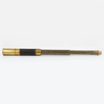 A brass telescope, around 1900.