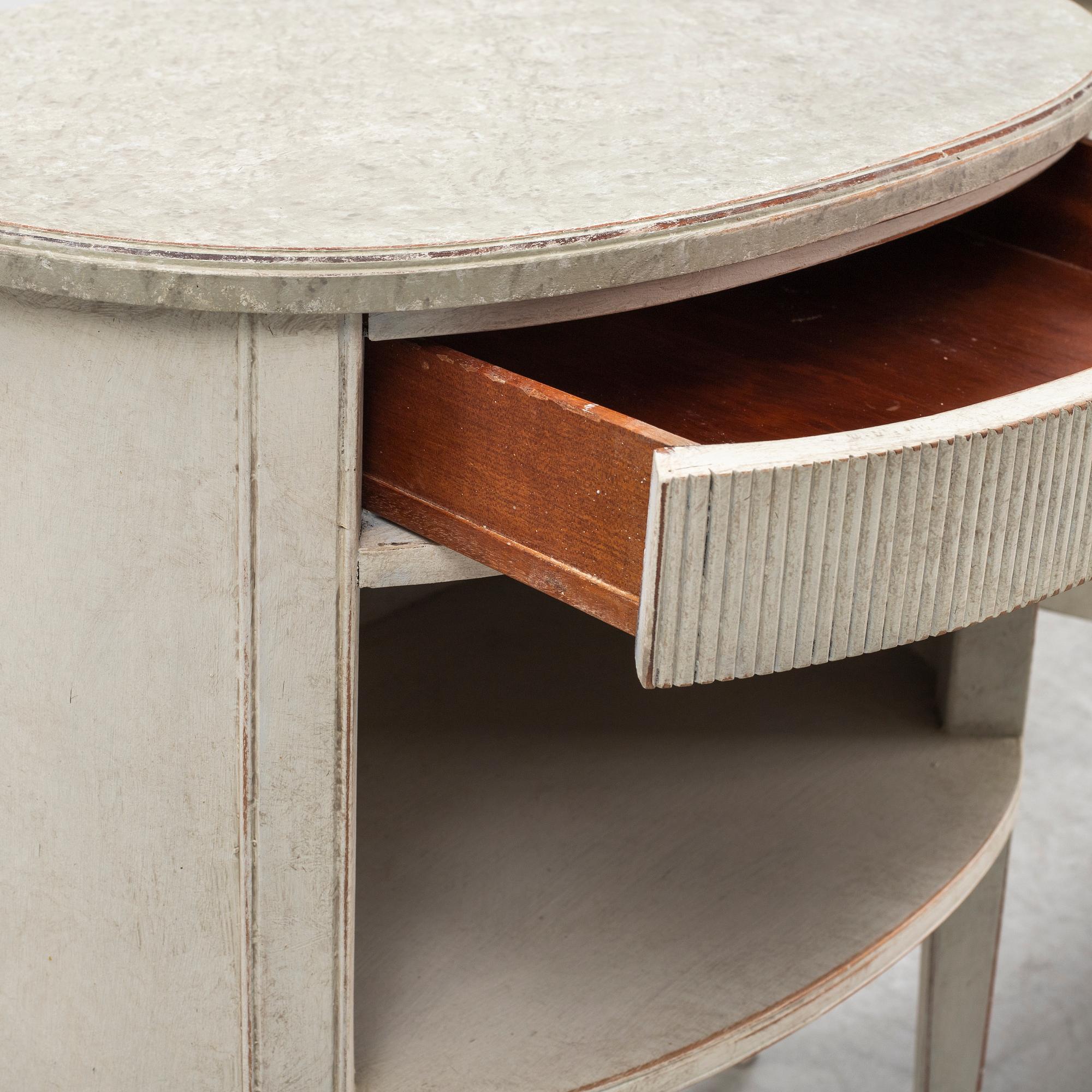 A painted pair of bedside tables from Nordiska Kompaniet.