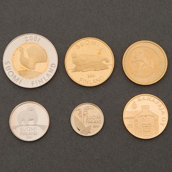 A six-piece Finnish coin collection, one in gold, 2001.