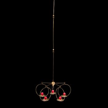 Kaija Aarikka, A candle-mobile "The Iltatulet candelabrum" in brass, design 1968.