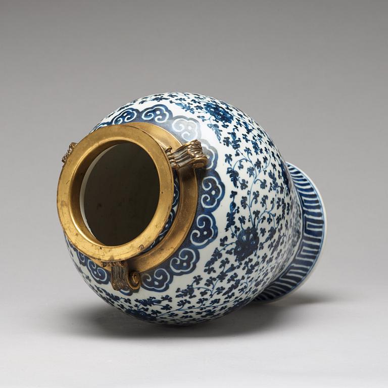 A blue and white bronze mounted vase, Qing dynasty, 18th Century.