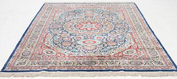 An oriental silk rug. c. 274 x 180 cm .