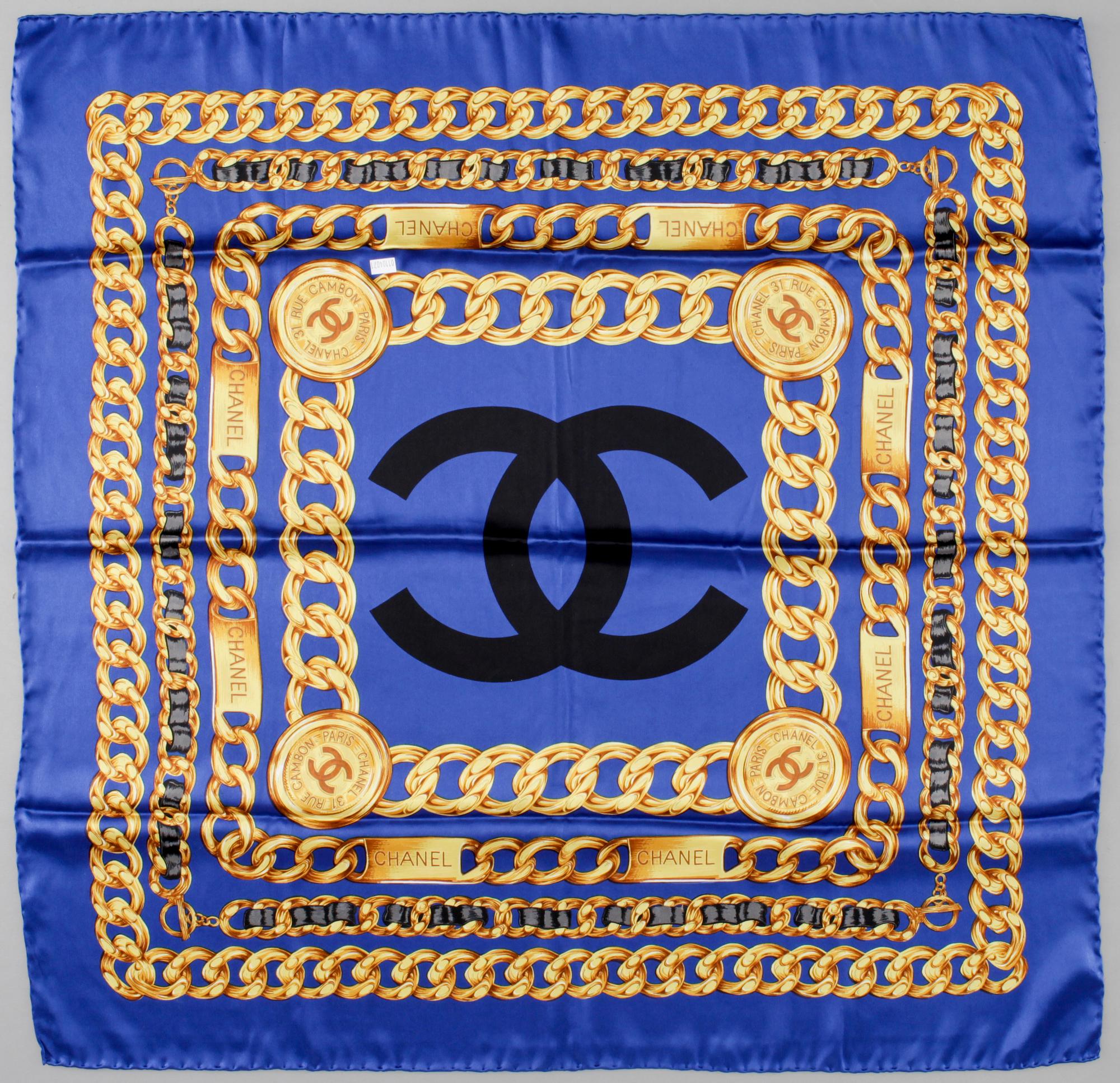A silk scarf by Chanel.