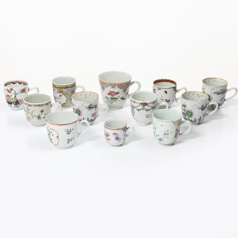 A group of 12 famille rose cups, Qing dynasty, Qianlong (1736-95).
