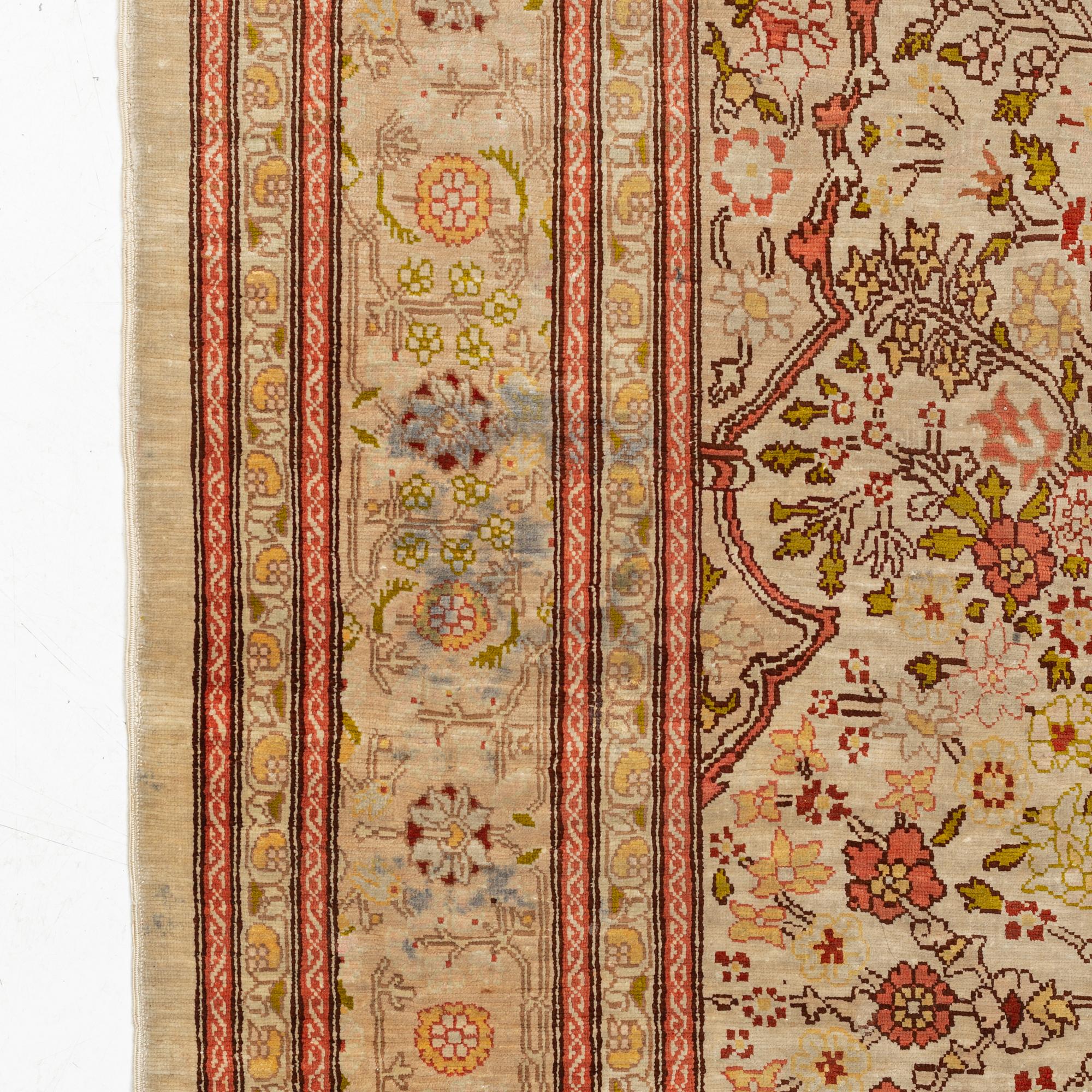 A Hereke silk rug, c. 130 x 87 cm.