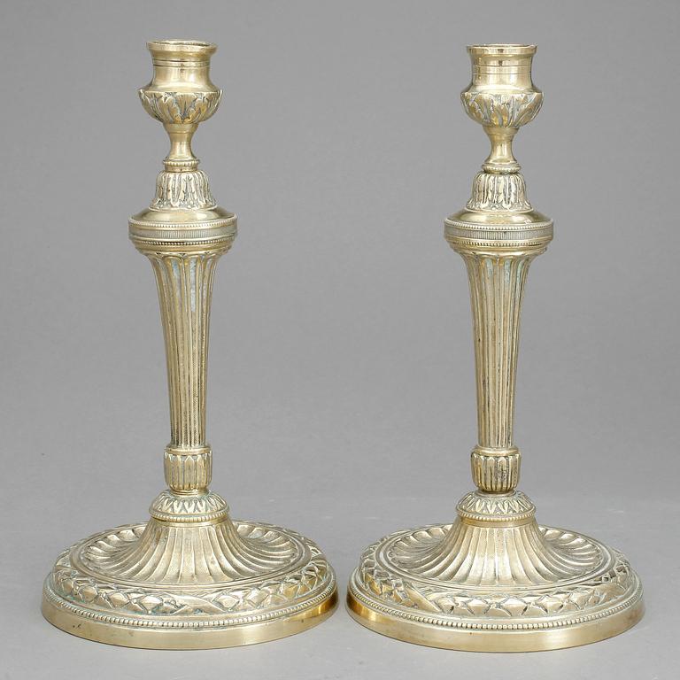 LJUSSTAKAR, ett par, empire-stil, 1800/1900-tal.