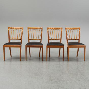A set of four mahogany and rattan dining chairs, Josef Frank, , model 1165, Svenskt Tenn, Stockholm.