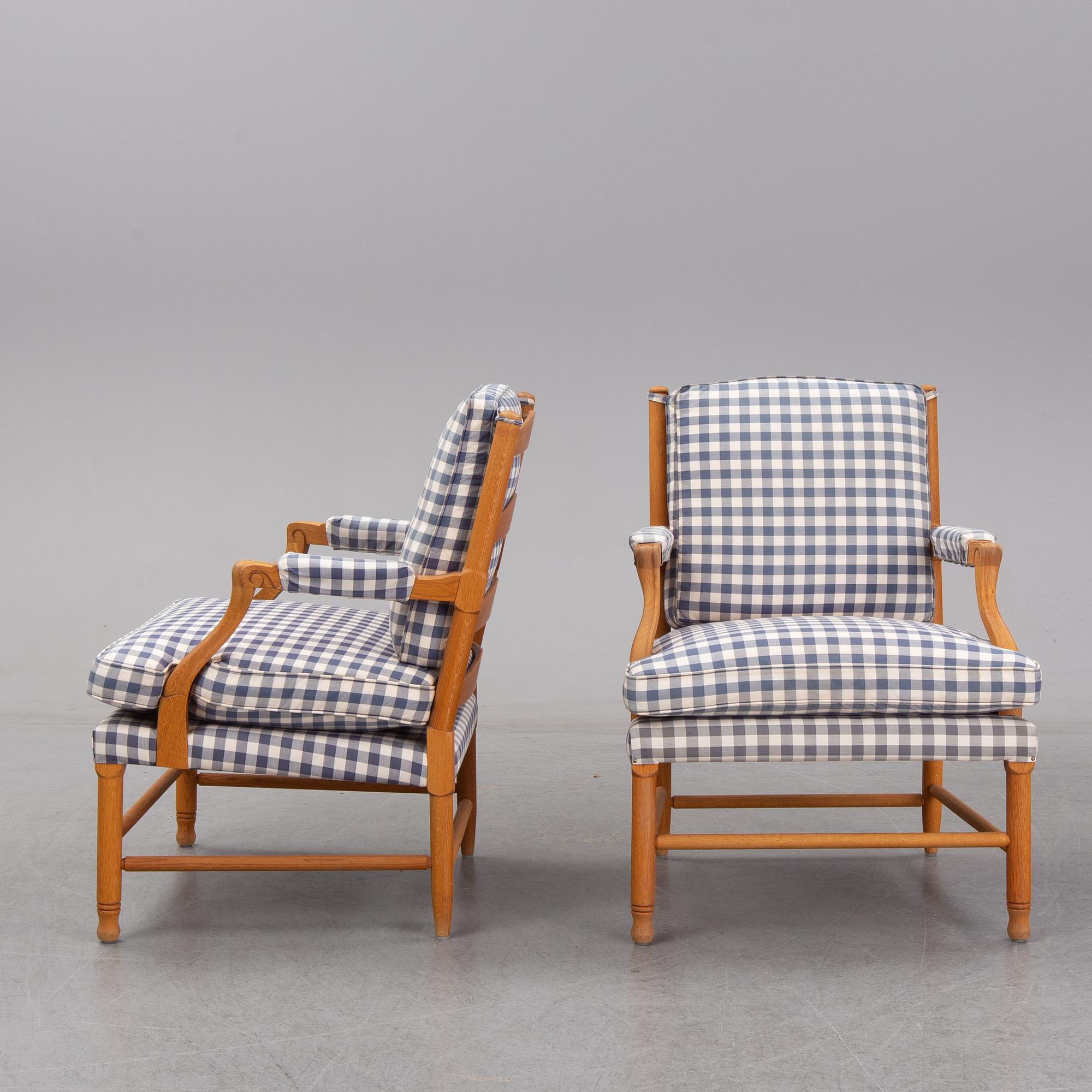 An end of the 20th Century pair of Gustavian style oak armchairs.