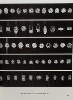 A lot of 4 books regarding watches.