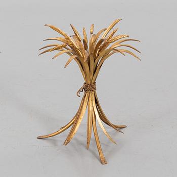 A HANS KÖGL ROUND GLAS AND GUILT METAL SMALL COFFEE TABLE.