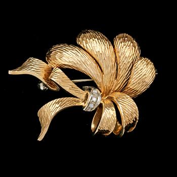 133. BROOCH, gold with small diamonds.