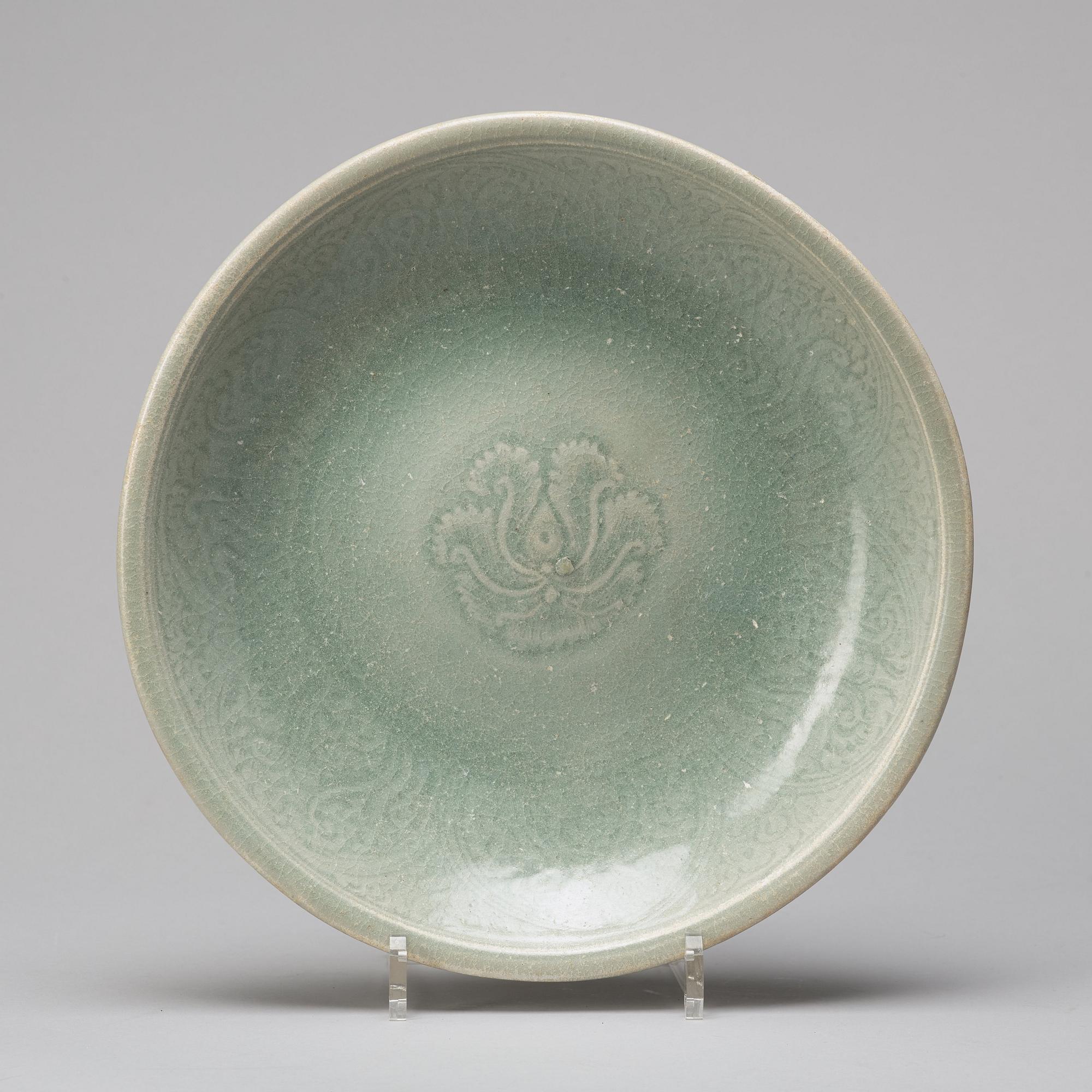 A celadon glazed dish, Thailand, Sawankhalok, 16/17th Century.
