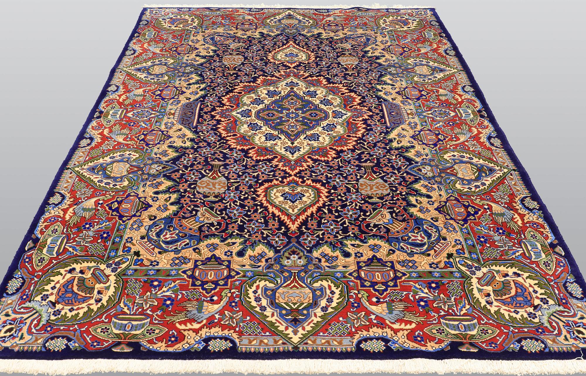 A carpet, Figural Kashmar, ca 315 x 203 cm.