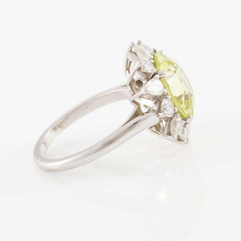 Ring, in the form of a flower, platinum with chrysoberyl and drop-cut and brilliant-cut diamonds.