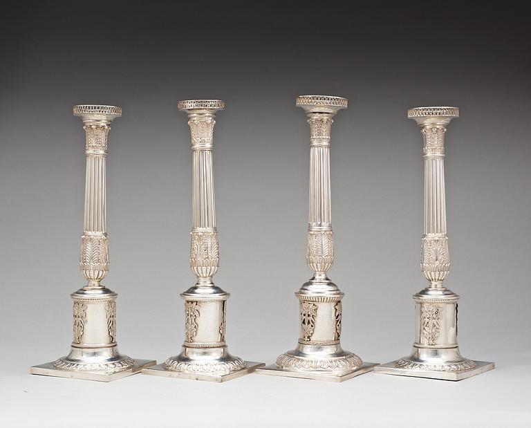 A matched set of four German 19th century silver candlesticks, marks of Altenburg.