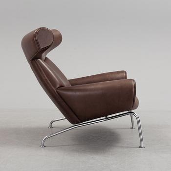 A Hans J Wegner "Ox"-Chair, Erik Jorgensen, Danmark, 21th century.