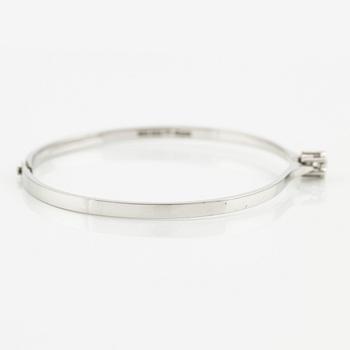 Bangle 18K white gold with a round brilliant-cut diamond.