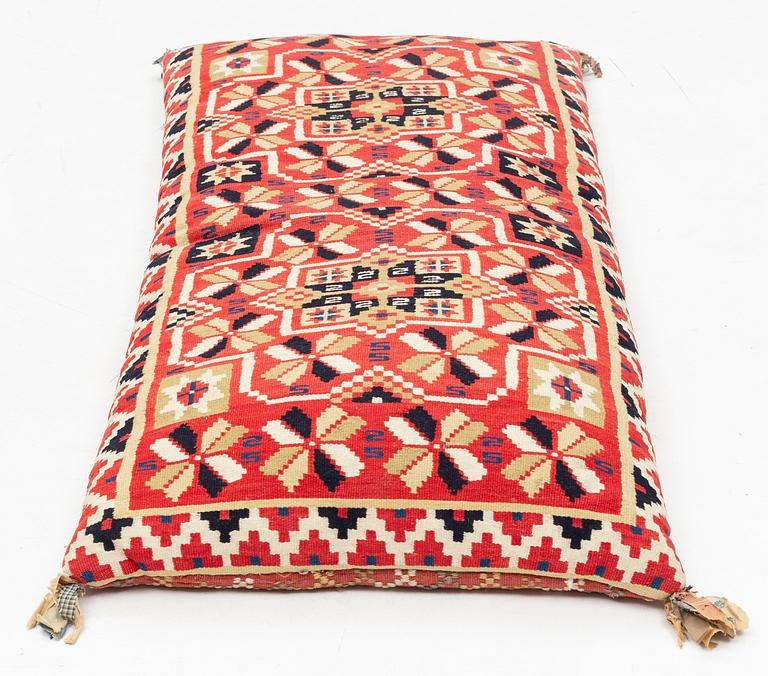 A carrige cushion, flat weave, 120 x 50 cm Scania, mid 19th century.