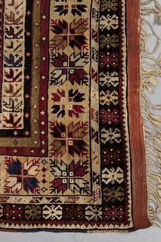 A carpet, antique Avanos, ca 190 x 136 cm (as well as 5 and 6 cm of flat weave on each end.).