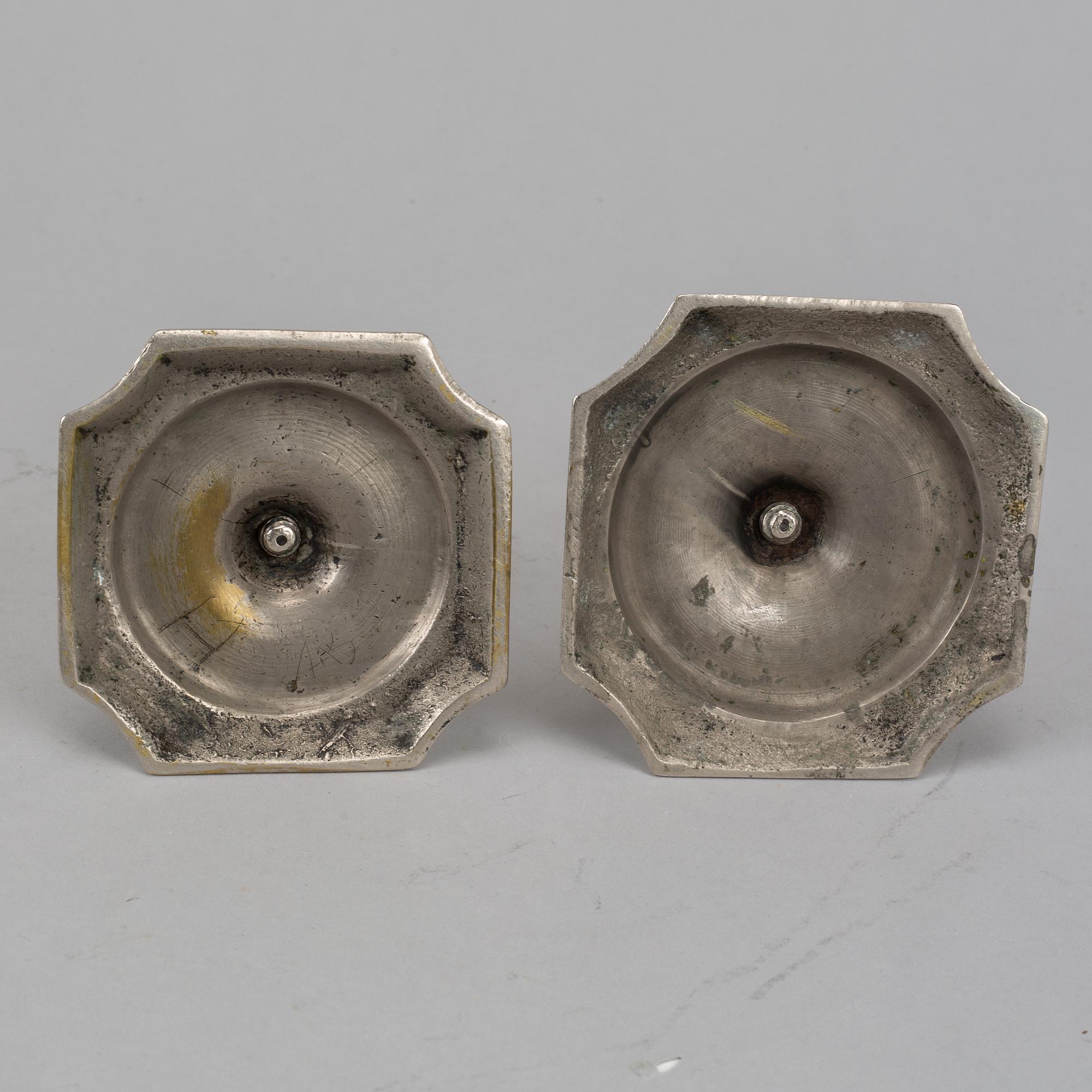 Two Swedish 18th century candlesticks.