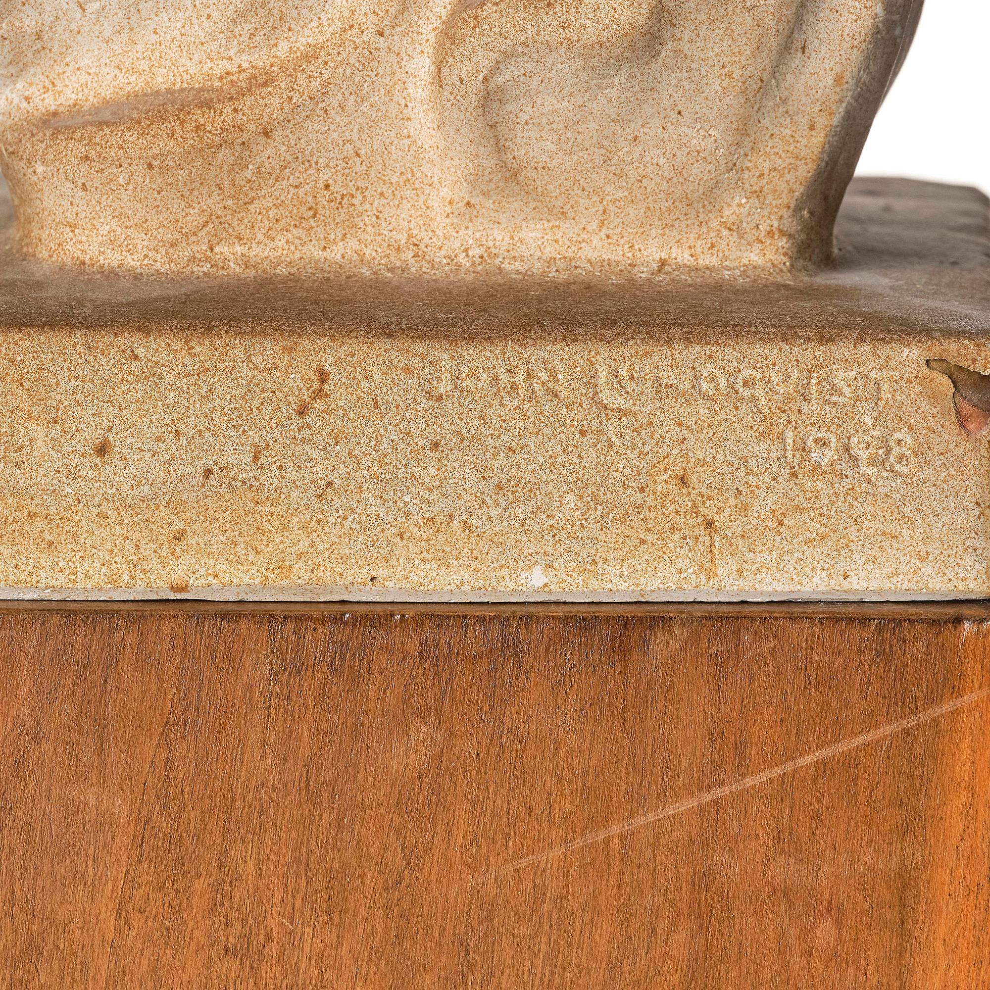 John Lundqvist, skulptur, lyrspelare, patinerad gips, daterad 1928.