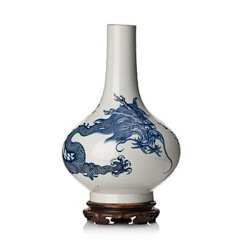 A blue and white dragon vase, Qing dynasty with Xuande six character mark.