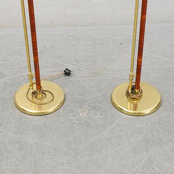 A pair of brass and leather floor lamps, Örsjö Designe, 21st century.
